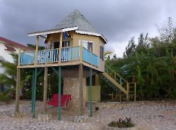 Ямайка (Jamaica). Домик в отеле Samsara Cliff Resort.